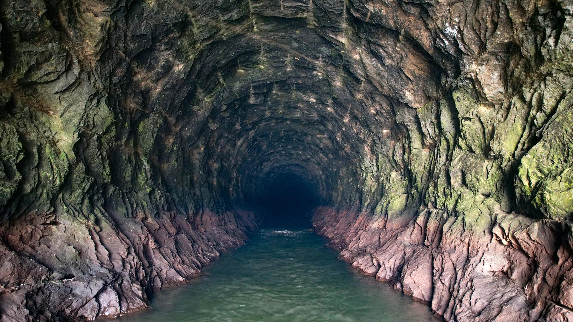 Anjuruli, Idukki: Water Outlet in Rock-Cut Tunnel Anjuruli, Idukki: Water Outlet in Rock-Cut Tunnel