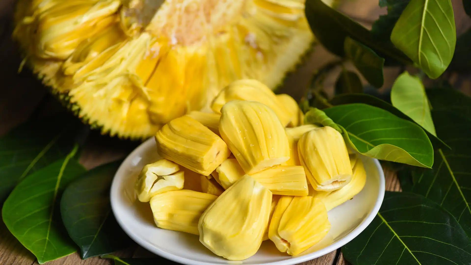 Sliced jackfruit with a whole fruit Sliced jackfruit with a whole fruit