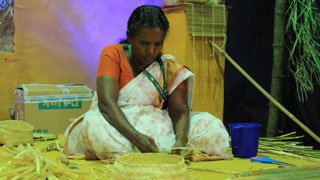 Sathi Murali from Kumarakom demonstrating traditional basket weaving at ongoing Kerala Travel Mart 2016 at Kochi