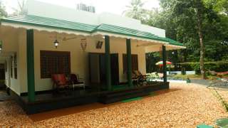 Click here to view the details of Kuttickatil Gardens Homestay