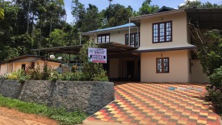 Click here to view the details of Ponmudi Plantation Homestay 