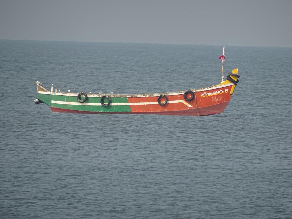 Fishing boat at Thumboli Beach, GEO coded photos, Near by attractions